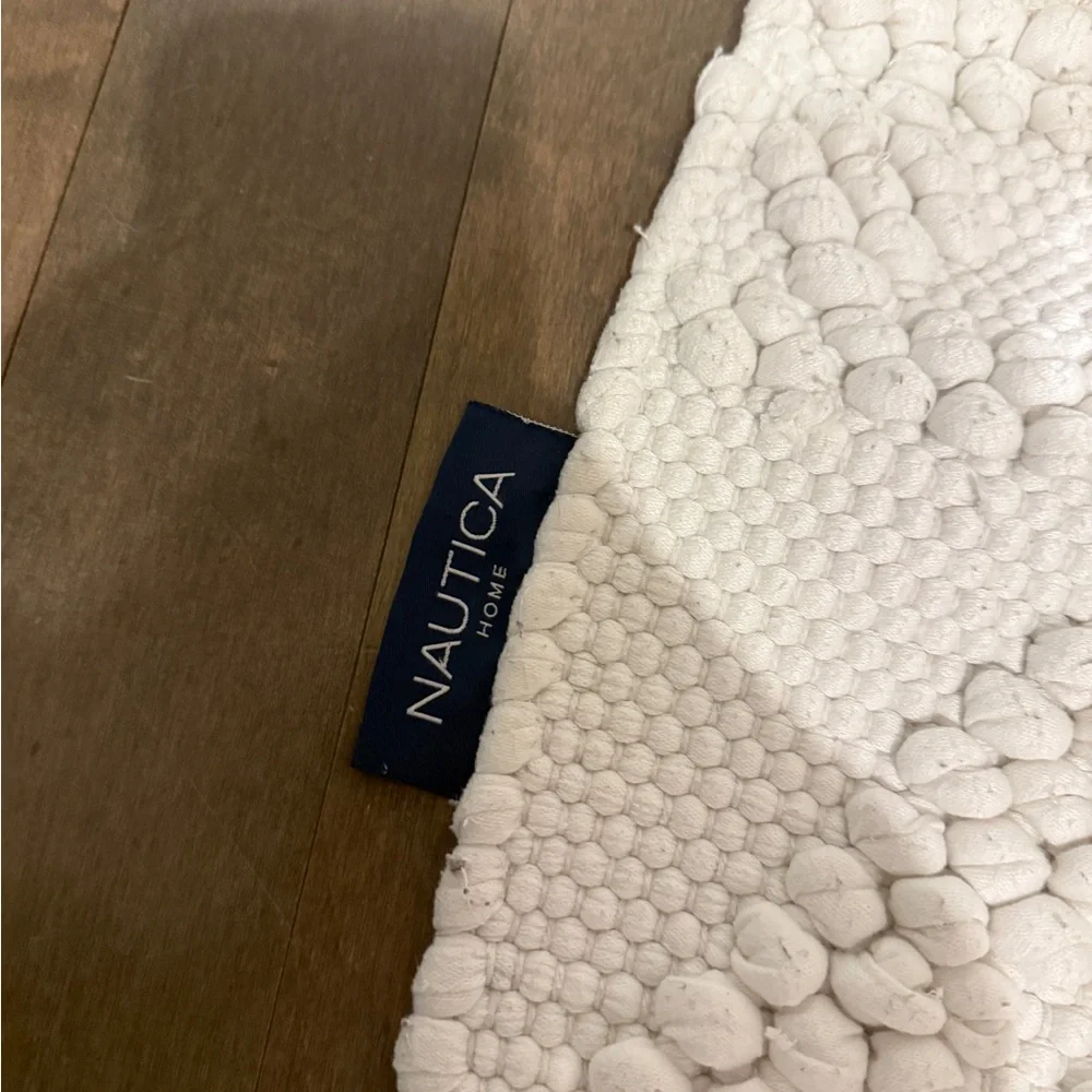 Nautica Cream Textured Bath Mat with Tassels